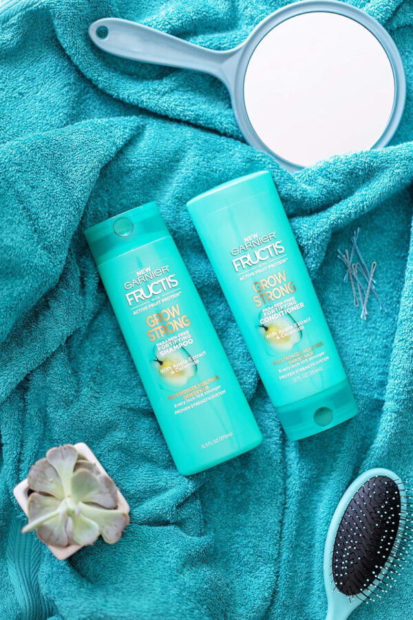 68931c0c19c87b0ee829899c2e7a031ff9e273bc27072207dbed8.jpg Garnier Fructis Grow Strong Conditioner, 33.8 Fl Oz, 1 Count (Packaging May Vary)