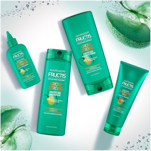68931c109fbad2462e5edb961f6dac9e7bc32f19e8e70e234cc29.jpg Garnier Fructis Grow Strong Conditioner, 33.8 Fl Oz, 1 Count (Packaging May Vary)