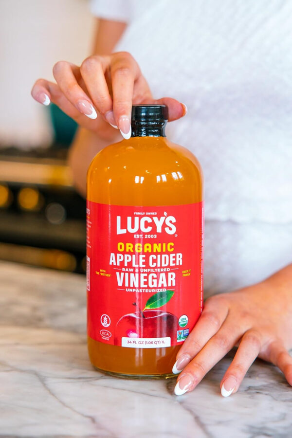6893885a0a904cb8bd0b79555f52b918e989a83e15118b51cce01.jpg Lucy's Family Owned - 34oz. GLASS BOTTLE (2 PACK) Organic, With the Mother, Apple Cider Vinegar, Unfiltered, Unpasteurized, Raw, and NonGMO